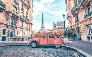 Avenue de Camoens in Paris with red retro car