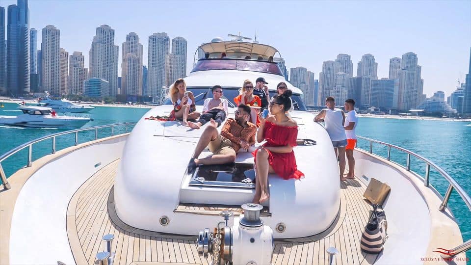 Luxury yacht cruising through the marina in Dubai