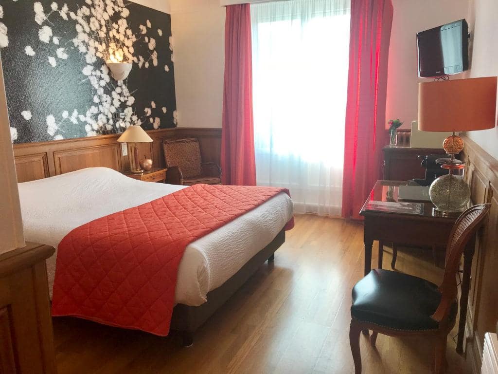 A bed or beds in a room at the hotel.