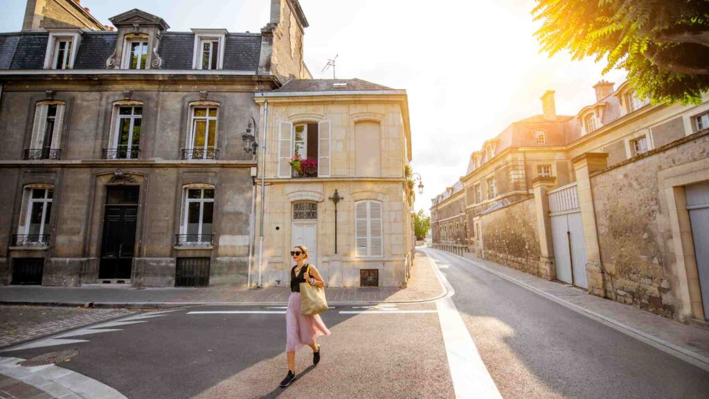 A woman walking on a street.